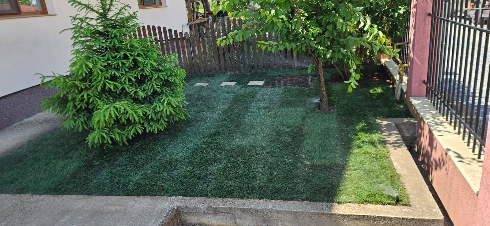 Acasă with a vibrant landscaped garden after a makeover