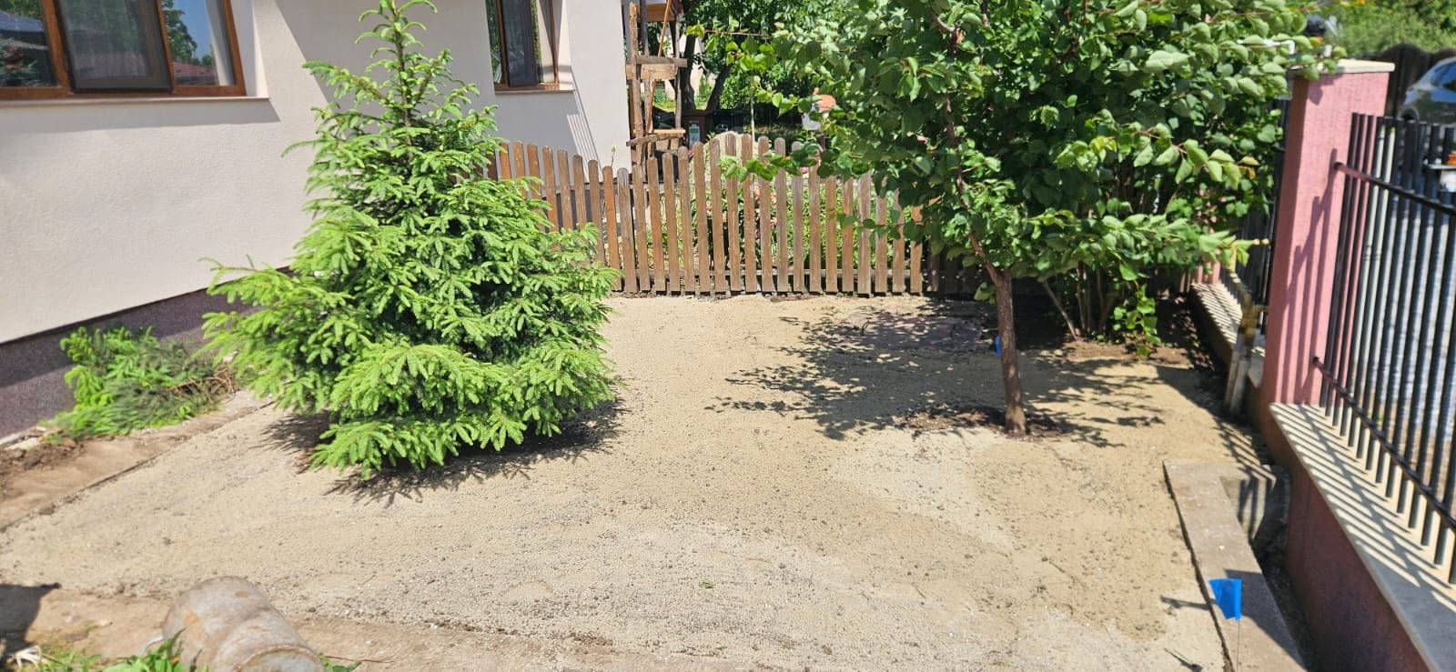 Same home garden shown faded before the makeover